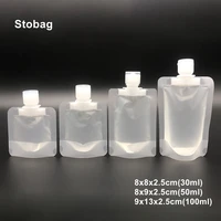 stobag 50pcs travel lotion packaging nozzle bags plastic transparent flip top cosmetic liquid stand up storage reusable pouches