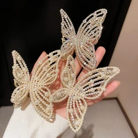 1pc rhinestones white faux pearls hair claws for women alloy hollow butterfly wings shark clips korean ponytail holder