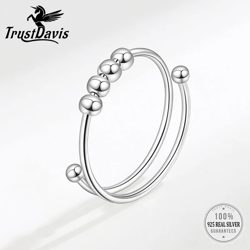 

Женское кольцо из серебра 925 пробы с вращающимся шариком