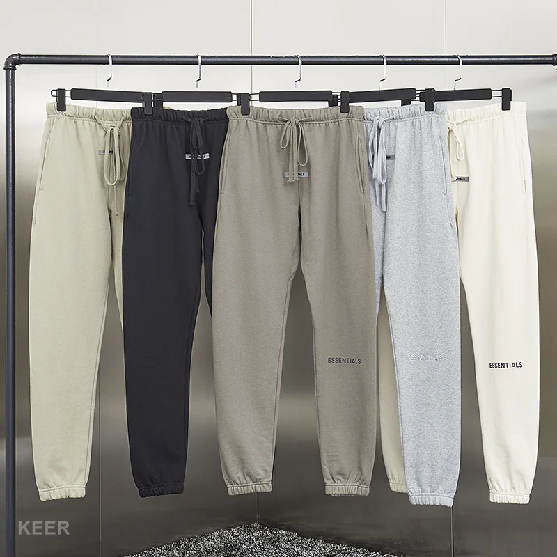 

Mens Jogging ESSENTIALS 1:1Pants Jerry Lorenzo Designer Printed Reflective Letters 100% Cotton Hip Hop Loose Unisex Sweatpants