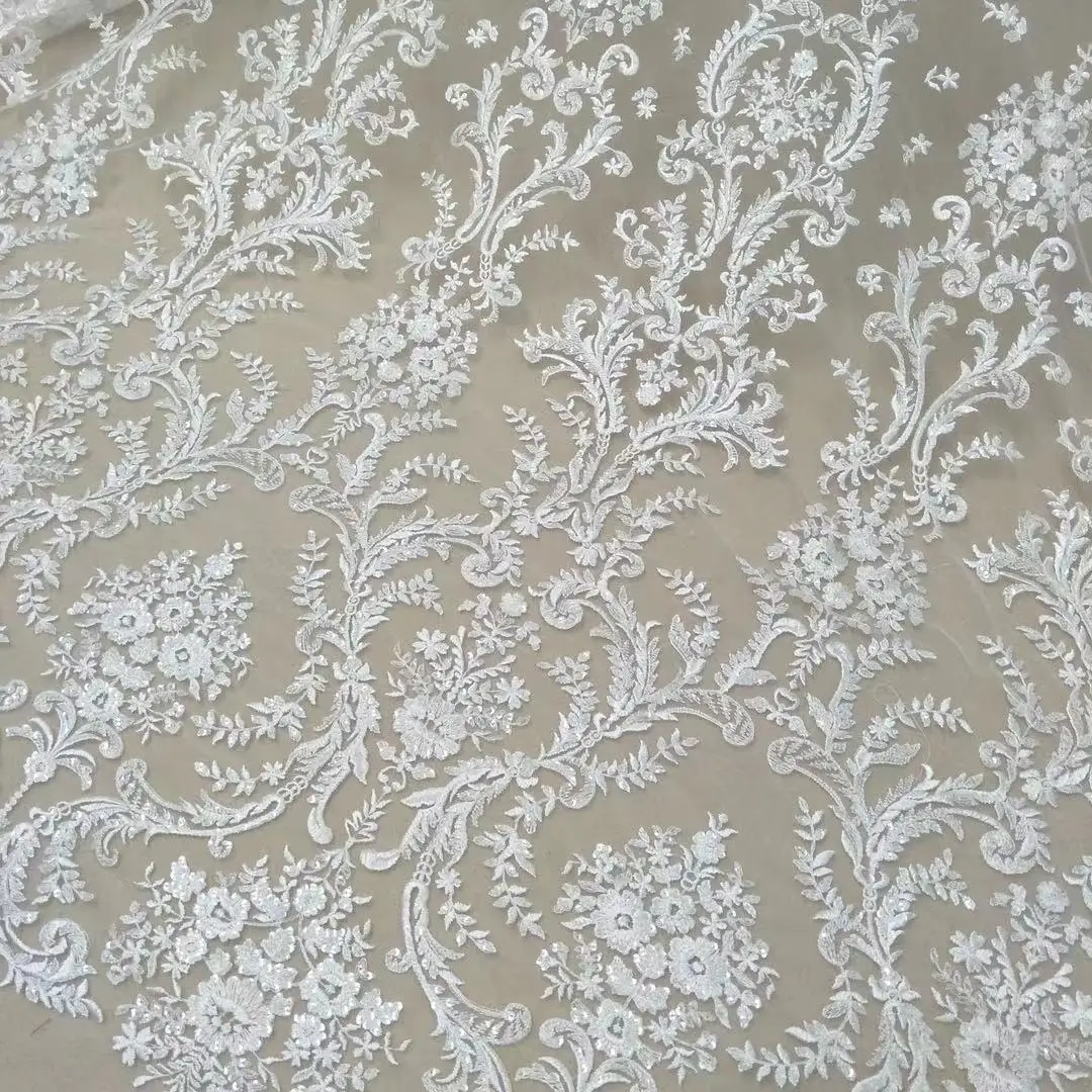 

2022 winter hot ivory white wedding dress fabric rayon material lace with sequins 130cm wide sold by size