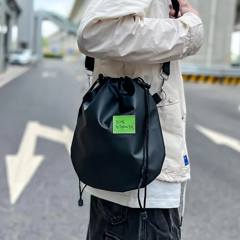 

Drawstring Messenger Bag Design Bag Couple Fashion Brand Harajuku Student Hit Color Shoulder Bag Female