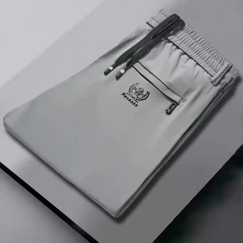 

Брюки мужские повседневные, эластичные штаны на молнии, со шнуровкой, со средней посадкой, с карманами