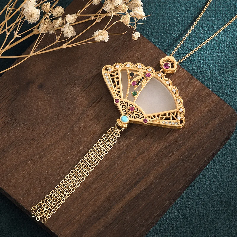 

2022 New China Style Cheongsam Jewelry Necklaces Gold Fan Inlaid Colorful Zircon Hetian Jade Tassel Chain Necklaces for Women