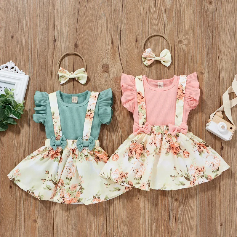 

2023 Little Girl's Clothing Cotton Pit Strip Flying Sleeve T Bow Print Suspender Skirt Suit Baby Girl Outfit Set