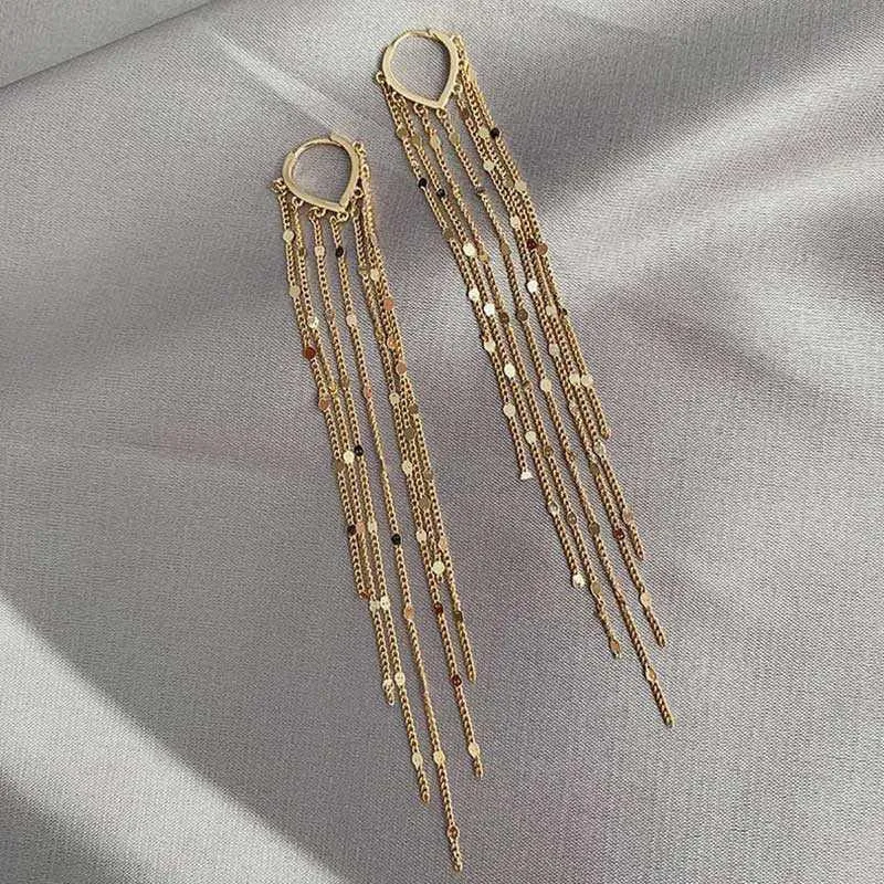 

Gorgeous Long Tassel Hoop Earrings Female Temperament Light Luxury Hollow Love Heart Earrings Korean Personality Jewelry Gift