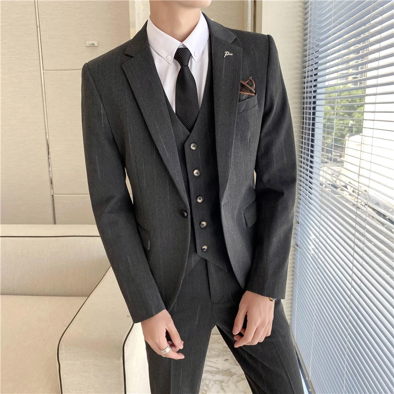

Autumn and winter new fashion gentleman (suit + vest + pants) business suit men's solid color casual Slim three sets