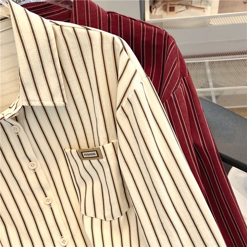 Женская рубашка-поло в полоску с длинным рукавом и бантом