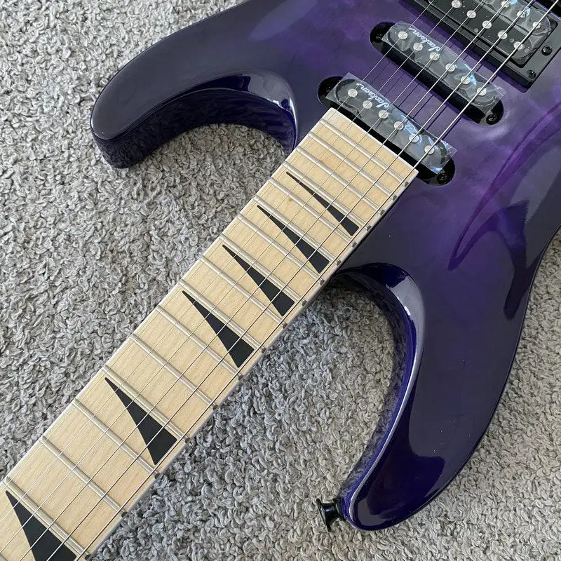 Фото Электрогитара Jackson JS34Q Dinky Arch Top, 24 лада, кленовый гриф, HSS, с рёхолистной декой, тремоло Floyd Rose, прозрачный фиолетовый цвет №3