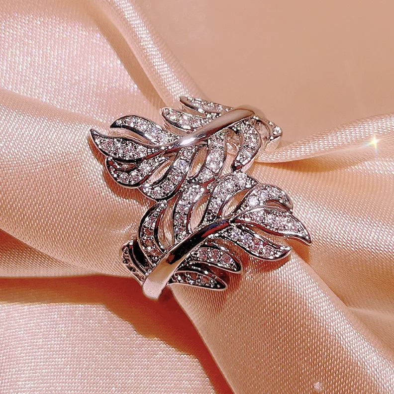 

ANGLANG Luxury Silver Color Leaves Shape Band Women Rings Inlaid Crystal Zirconia Stylish Female Party Ring Fashion Jewelry Gift