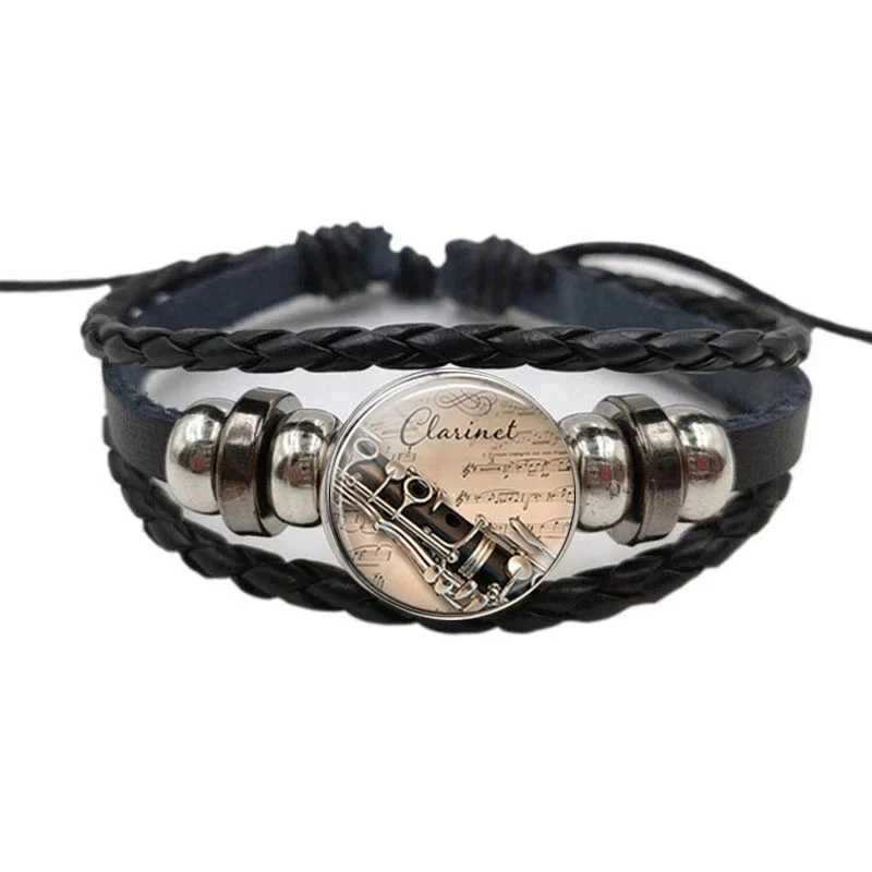 Черный классический музыкальный инструмент пианино гитара кларнет флейта