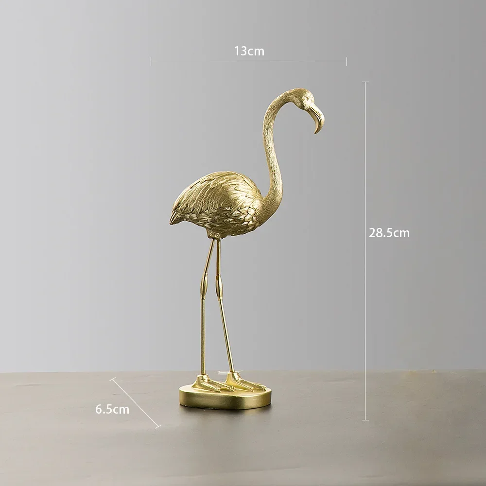 

Золотая статуэтка фламинго полимерного материала