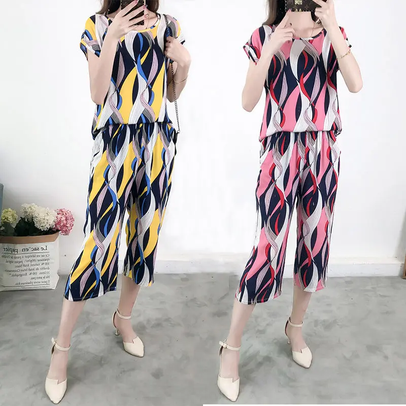 

Women 2022 Summer Vintage Floral Casual 2 Two Piece Set Female Loose Tee T Shirt Ladies Tops and Cropped Pants Fashion Suit N79