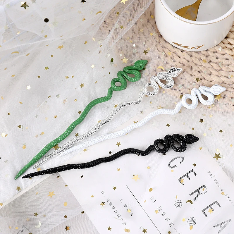 Металлическая зелёная заколка для волос в форме змеи