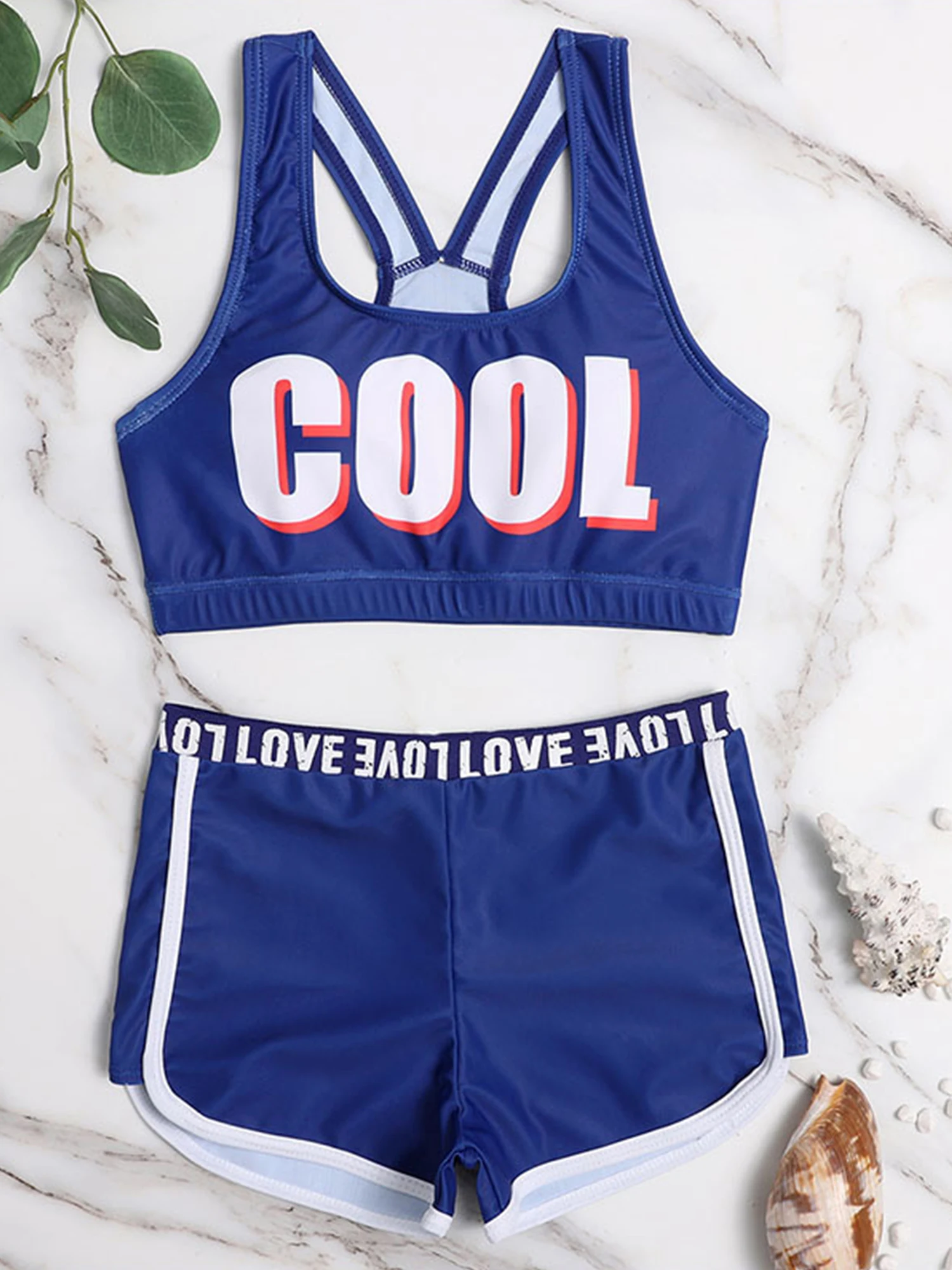 

Купальник для девочек с буквенным принтом, модный топ без рукавов и с Y-образной спиной, шорты с дельфином и эластичным поясом, летние пляжны...