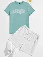 men letter graphic tee and slant pocket track shorts set
