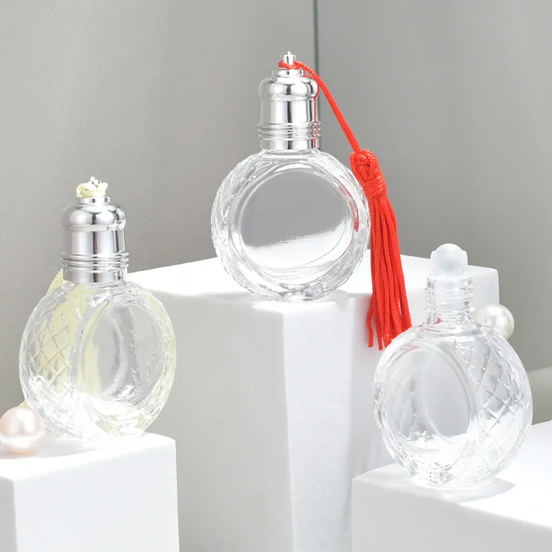 

High End New Product 10ml Ball Perfume Sub Bottled Essential Oil Travel Portable Sample Ball Bottle Glass Empty Bottle New