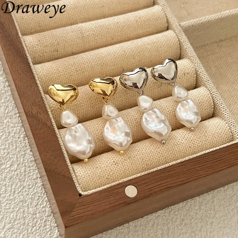 Женские серьги-подвески с жемчугом