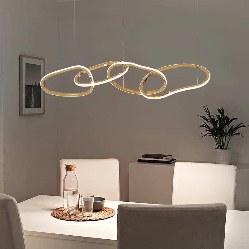 

Минималистичная подвесная люстра в стиле пост-модерн, светильник из нержавеющей стали для столовой, офиса, ресторана, бара, креативные коль...