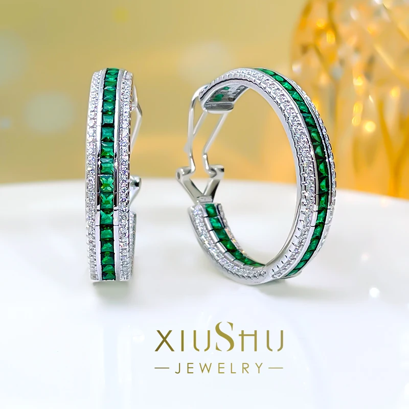 

Fashionable, luxurious and personalized artificial Emerald 925 sterling silver earrings inlaid with high carbon diamonds