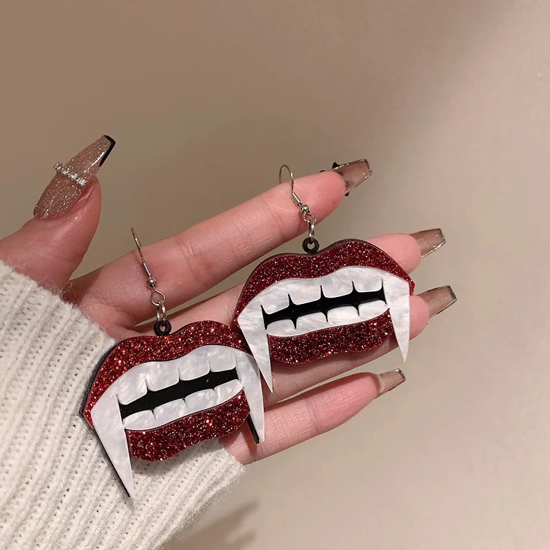 

Funny vampire tooth earrings European and American personality net red ear hooks Halloween personality earrings boho long