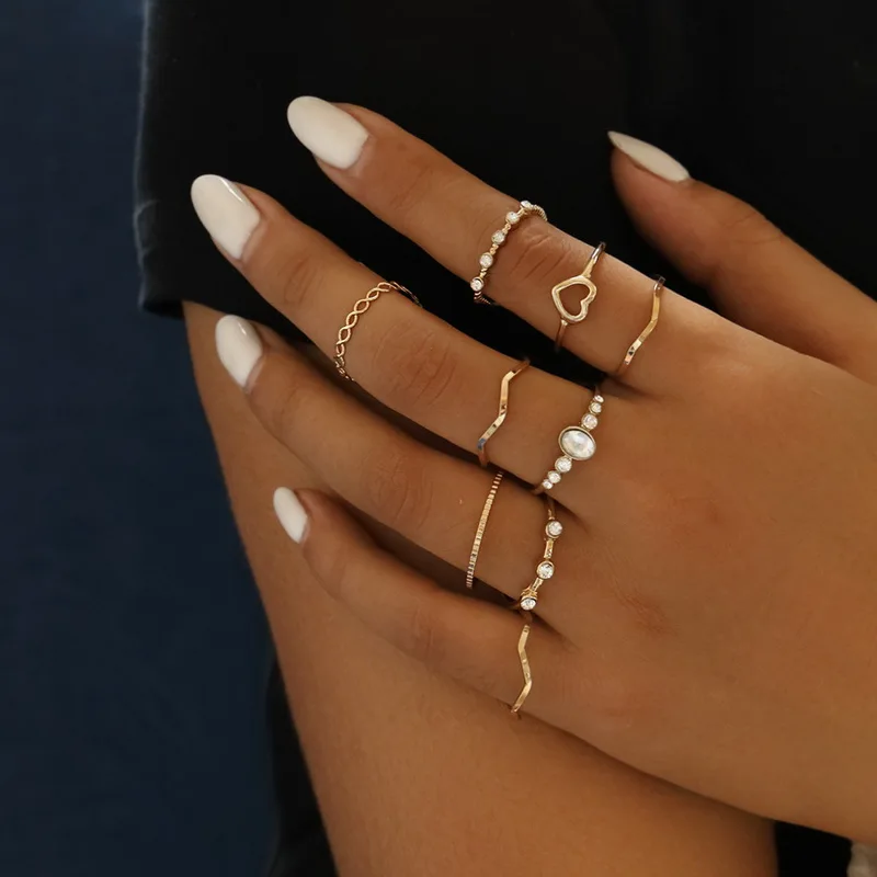 

Bohemian Hollow Heart Knuckle Finger Rings Set For Women Simple Waves Geometric Oval Imitation Pearl Wedding Ring Trendy Jewelry