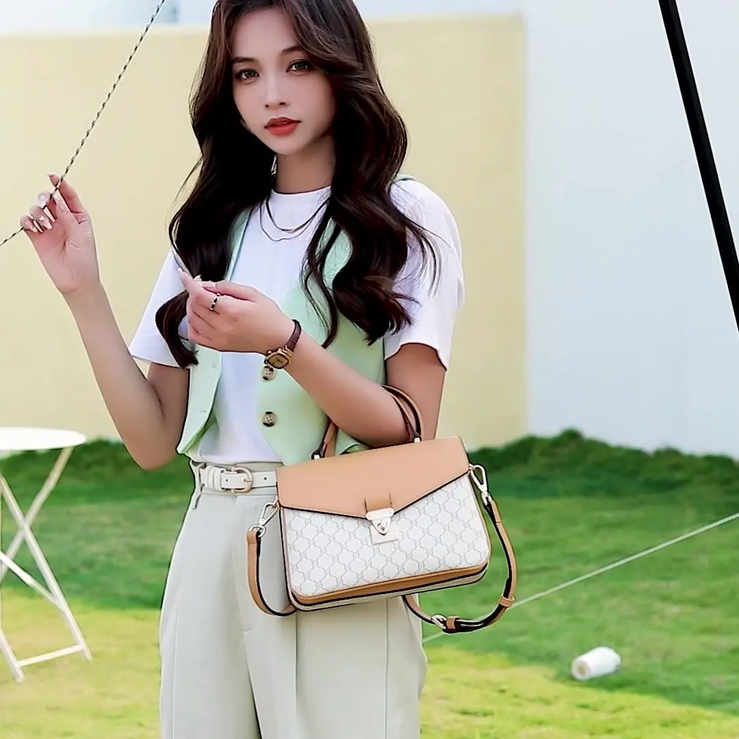 

Women's bag 2023 new tide fashion senior sense large capacity women's cross-body portable female bag leather presbyopia W658