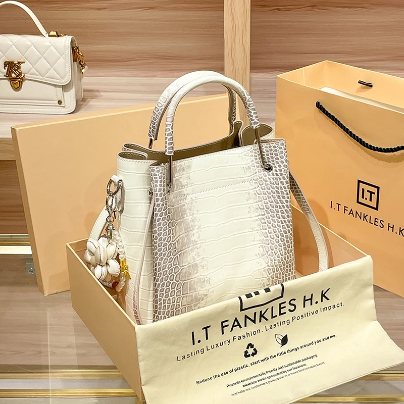 Брендовая кожаная женская сумка новинка 2024 портативная сумка-мешок женские