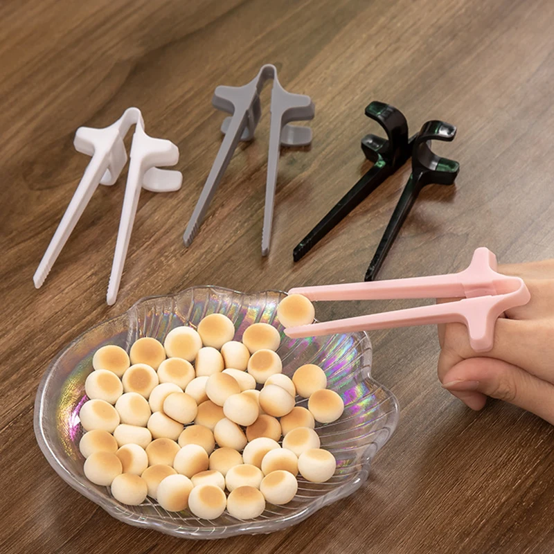 

Plastic Finger Chopsticks Game Player Snack Chopstick Holder lazy Assistant Clip Training Learning Chopsticks