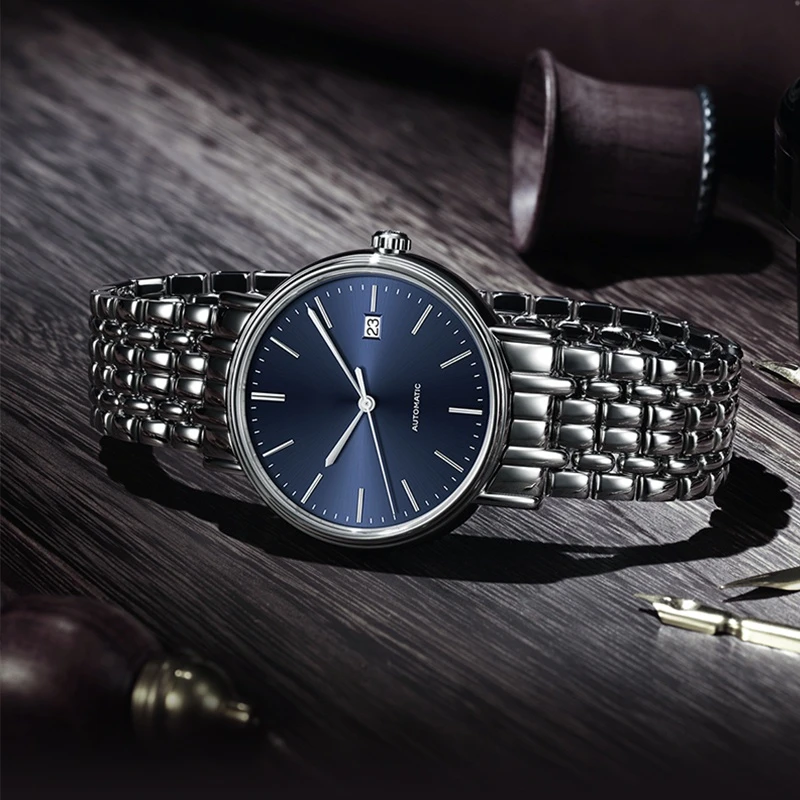 

Новые мужские спортивные часы с синим циферблатом, модные автоматические механические часы, браслет из нержавеющей стали, сапфировое стекл...