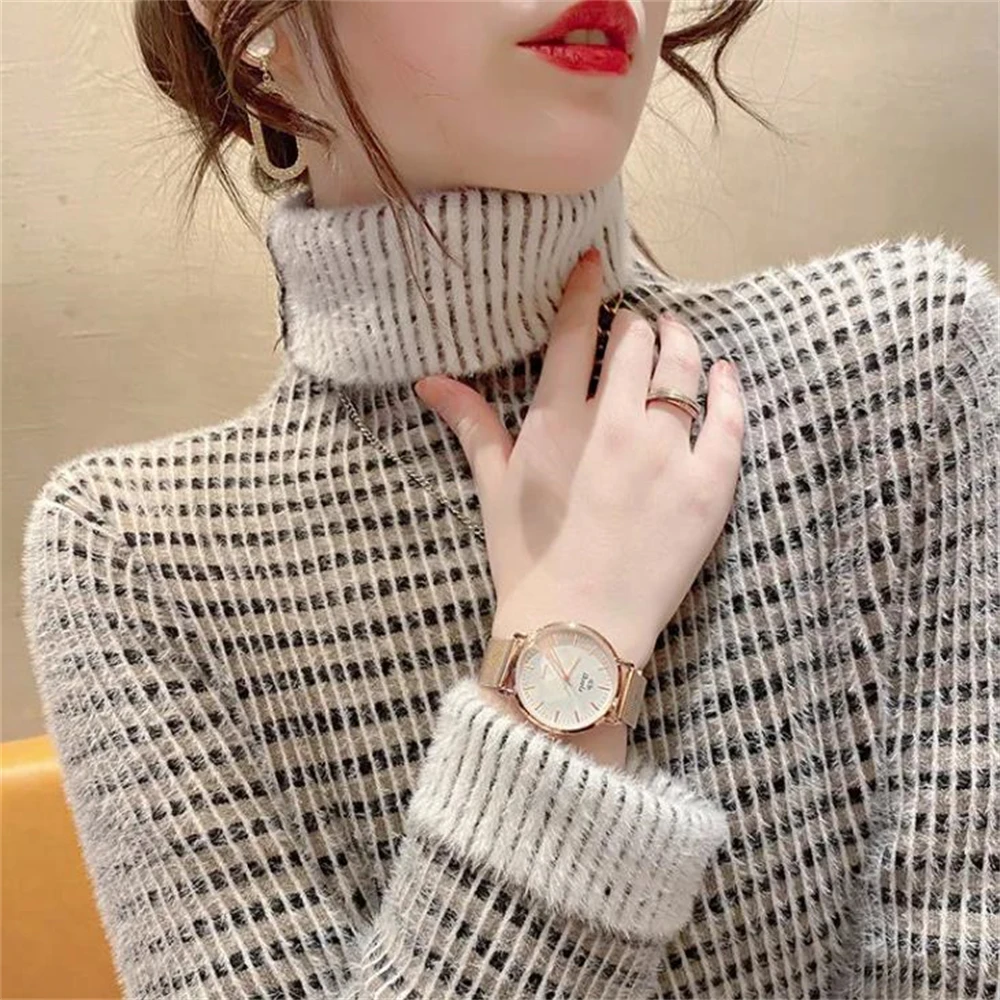 Женский трикотажный джемпер с длинным рукавом в полоску