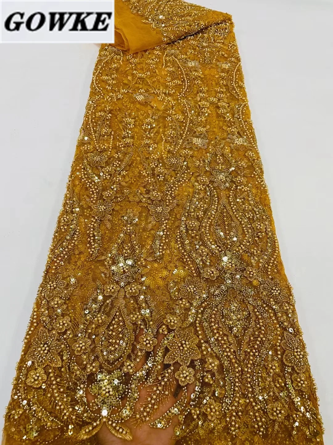 

Роскошная золотая французская Тяжелая кружевная ткань ручной работы с бусинами 5 ярдов нигерийские блестки с жемчужиной вышитая Тюлевая ткань свадебное платье