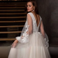sexy bridal deep v neck boho wedding dresses 2022 design delicate decals light champagne long sleeve wedding gowns open back