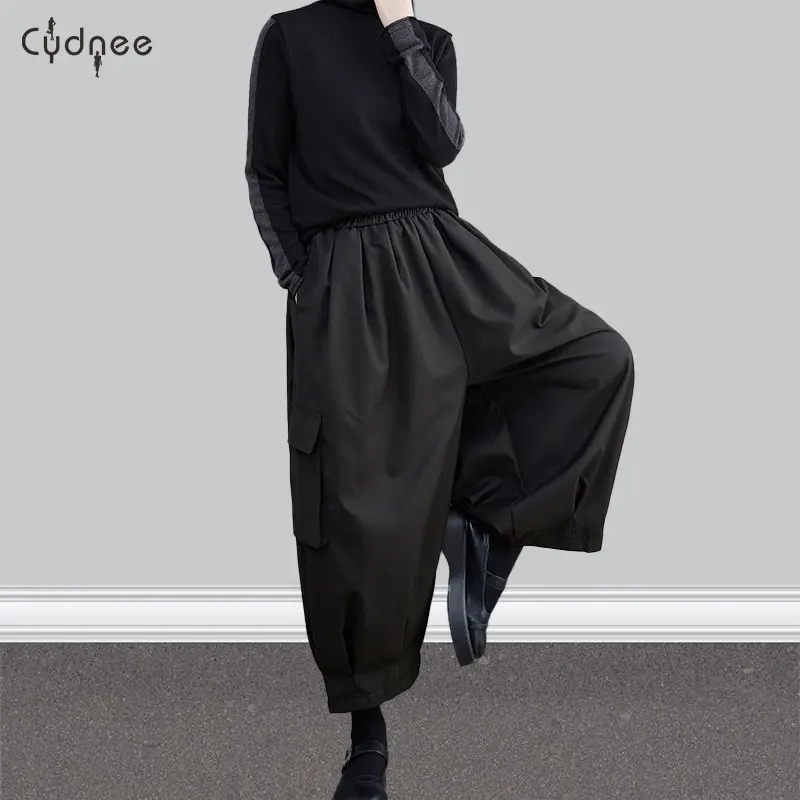 Женские широкие длинные брюки с высокой эластичной резинкой на талии и карманами