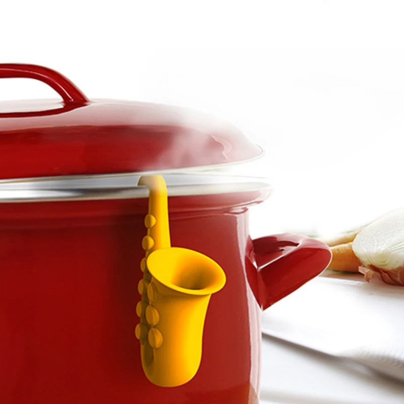 Creative Kitchen Utensils Horn Saxophone Shaped Silicone Pot Cover Lifting Anti Overflow Device Stand for Lids Lid Holder Tools |