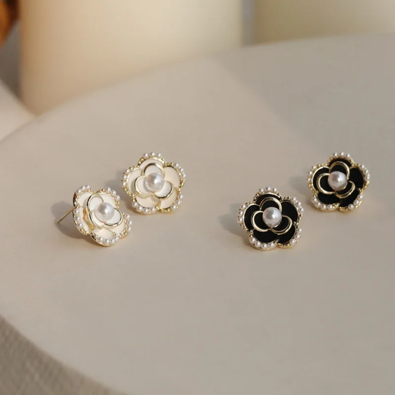 

Camellia flower shows small face 925 silver needle Earrings Black trend high sense VINTAGE EARRINGS cold wind Earrings