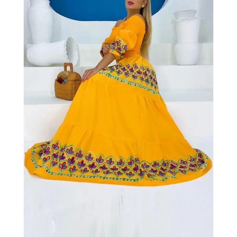 Женское длинное свободное платье макси желтое в этническом стиле с высокой