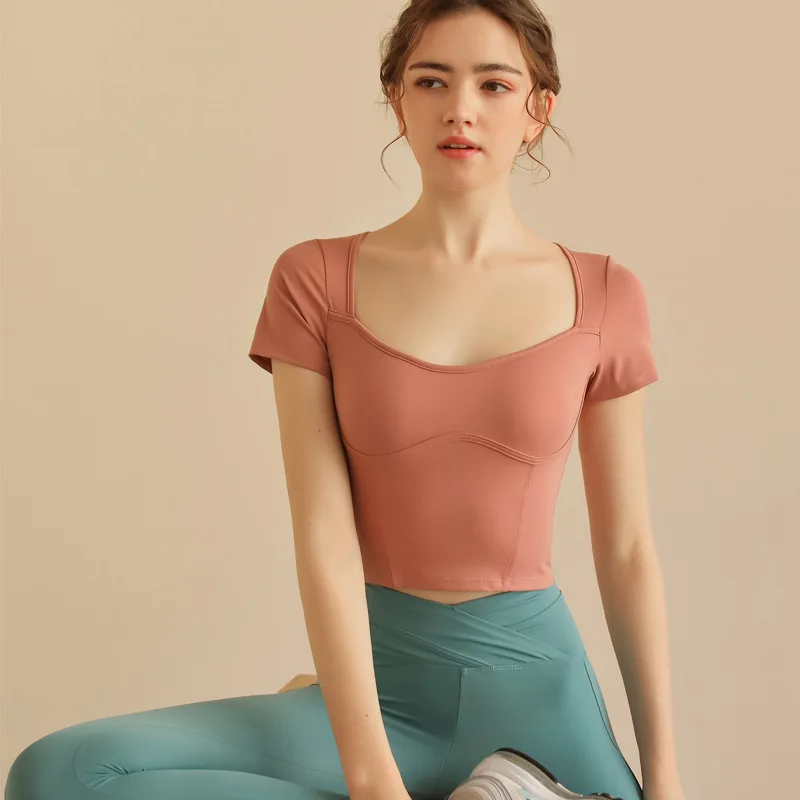 

Одежда для йоги с нагрудной подушечкой Женская Спортивная одежда для бега фитнеса с коротким рукавом в стиле интернет-знаменитостей Высоко...