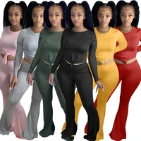european and american womens fashion all match solid color tight fitting long sleeved flared pants two piece set