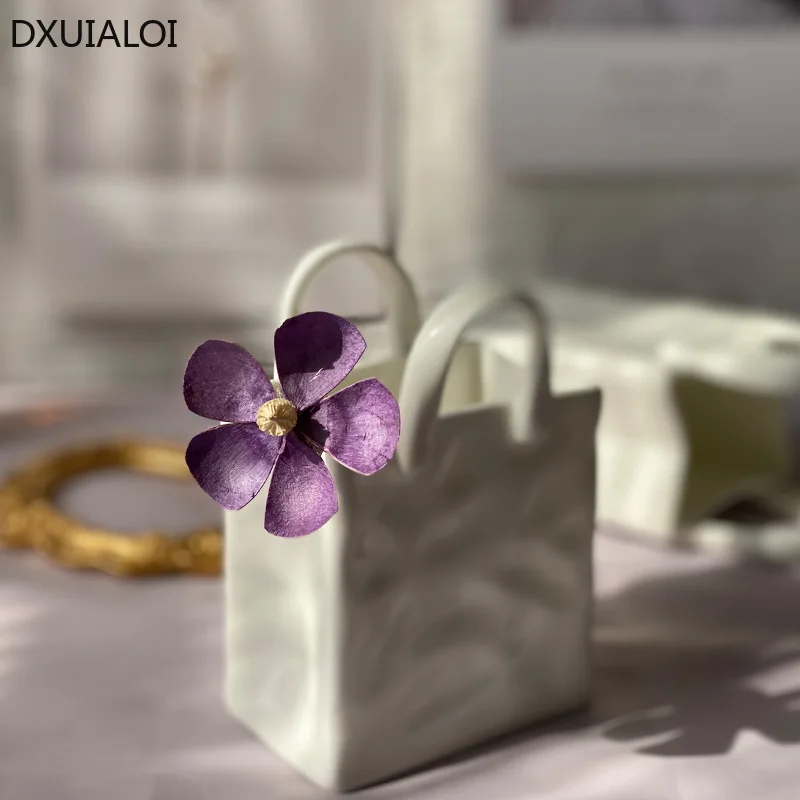 

Современная Минималистичная креативная керамическая ваза DXUIALOI для хранения в столовой, декоративная ваза из костяного фарфора для гостино...