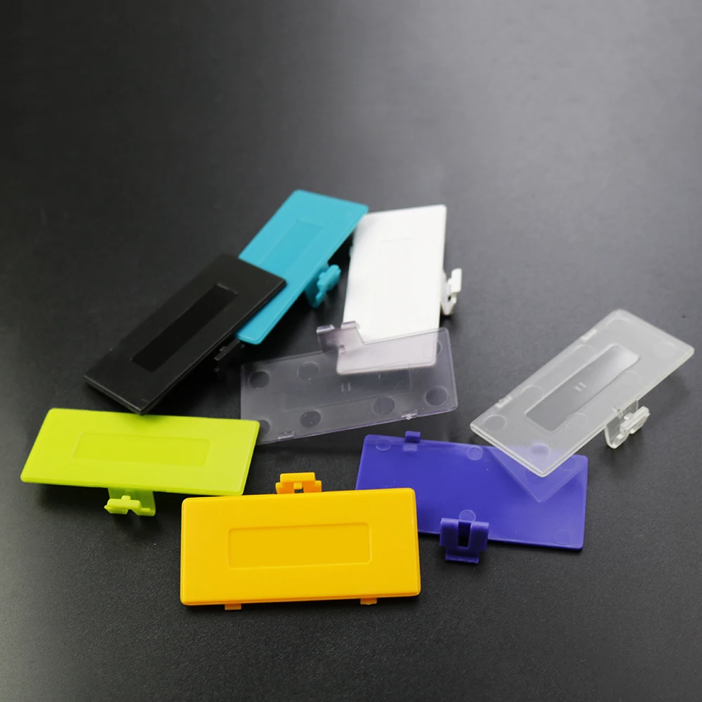 Фото YUXI 1 шт. 8 цветов на выбор, сменная Крышка батарейного отсека для Game Boy Pocket Gameboy GBP, Крышка батарейного отсека №3
