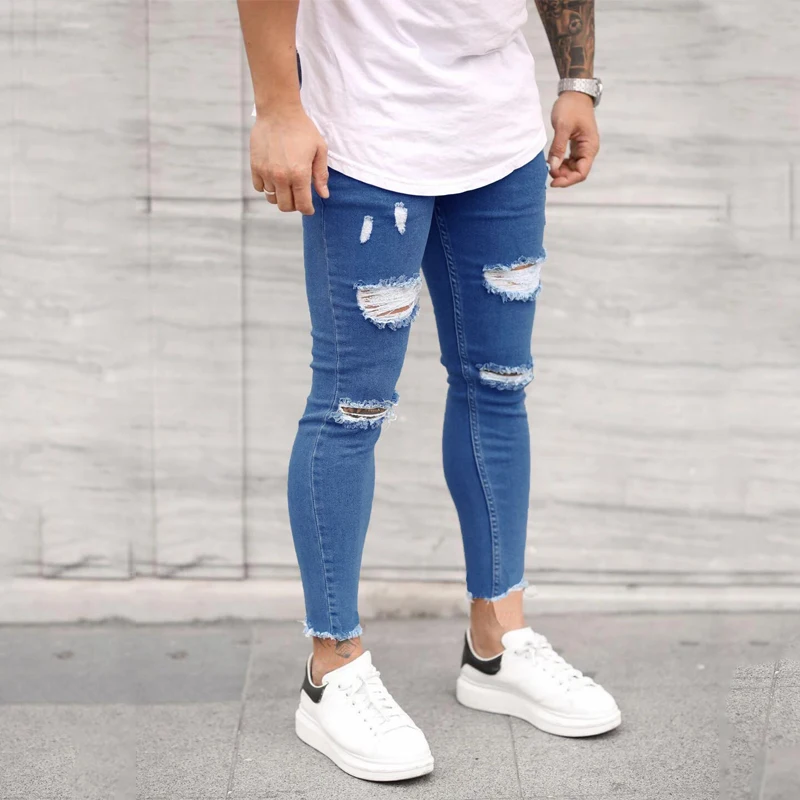 European and American new men's ripped elastic skinny skinny jeans torn nine-point jeans Youth fashion trend casual trousers