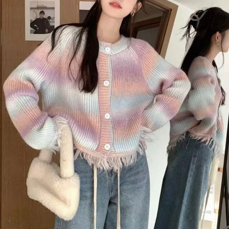 

Soft waxy sweater coat women's autumn and winter tassel design sense is slim, foreign style wears knitted cardigan women.