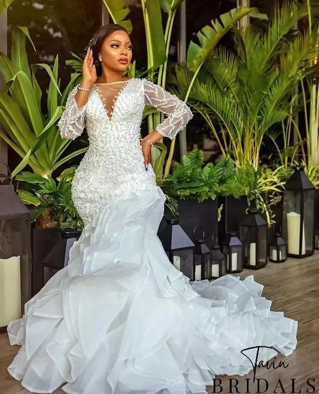 

Customers Often Bought With Similar Items Gorgeous Ruffles Mermaid Wedding Dresses Sheer Neck Sequined Long Sleeve Beaded 2023