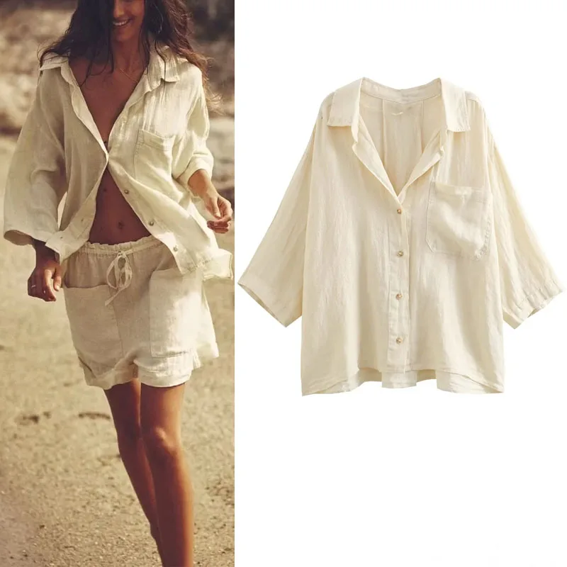 

TRAF Ladies Loose Shirts Lapel Long Sleeve Button Top Pocket Decorate Asymmetric Hem Shirt Casual Blouses For Women Fashion 2023