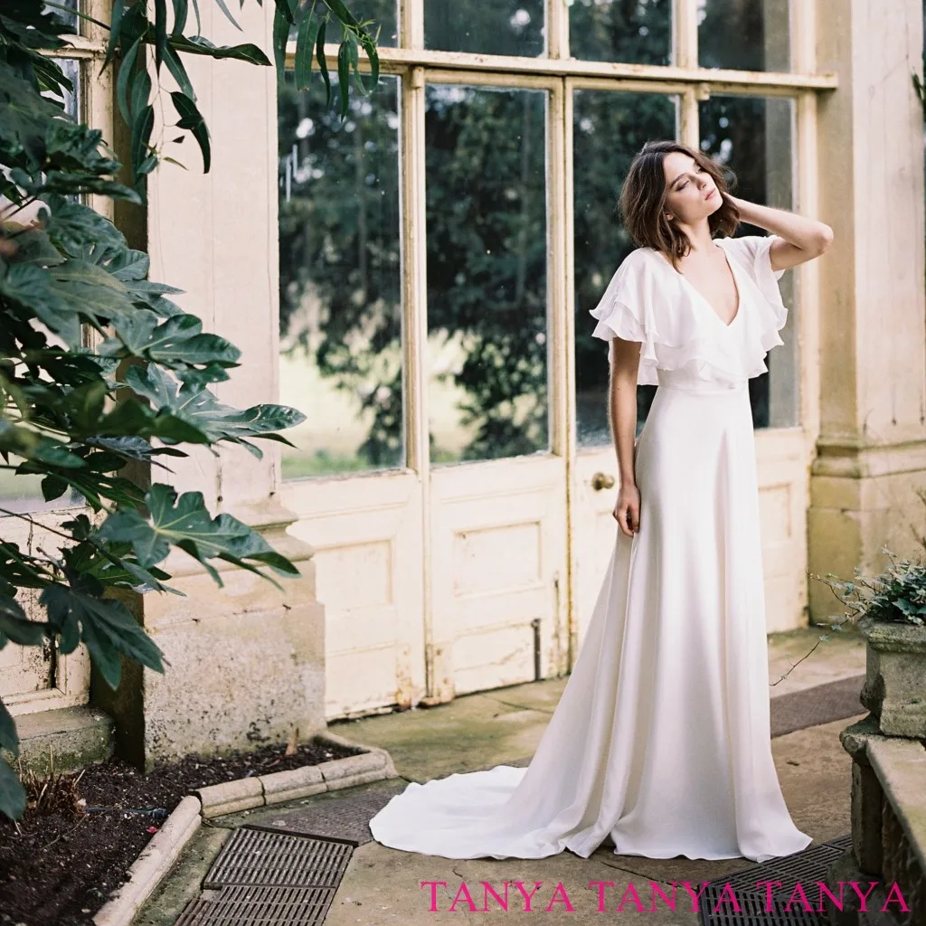 

Sexy V-neck Sleeveless Wedding Dresses Elegant Butterfly Sleeves Backless Bridal Gowns Simple Robe De Mariée Custom Made SWD757