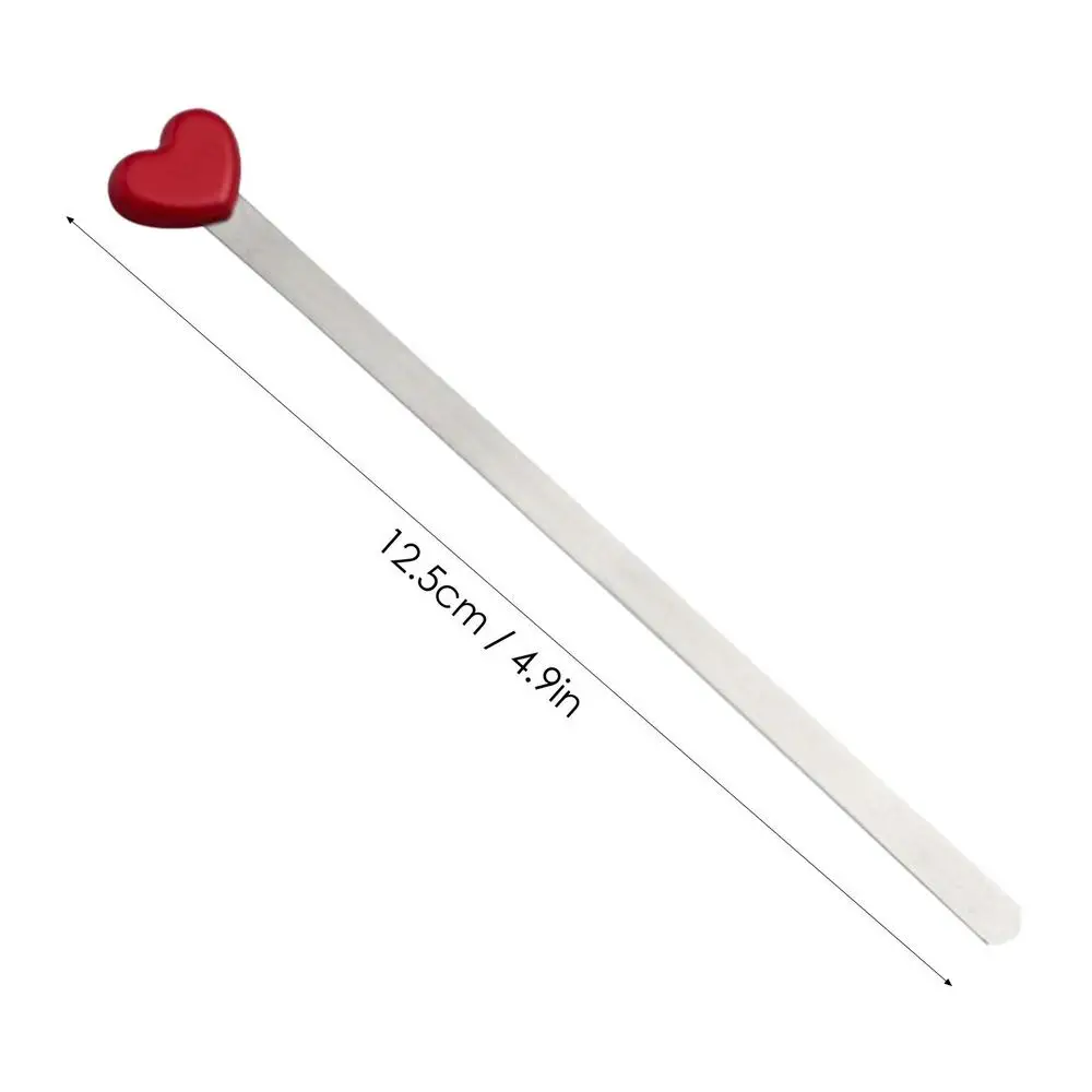 

Металлическая закладка в форме сердца