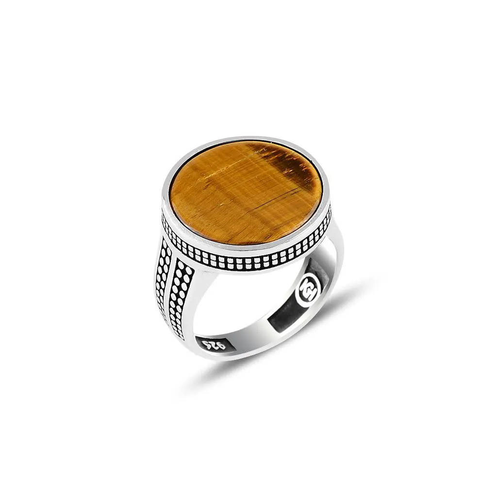

Кольцо из серебра 925 пробы с тигровым глазом и круглым узором в горошек