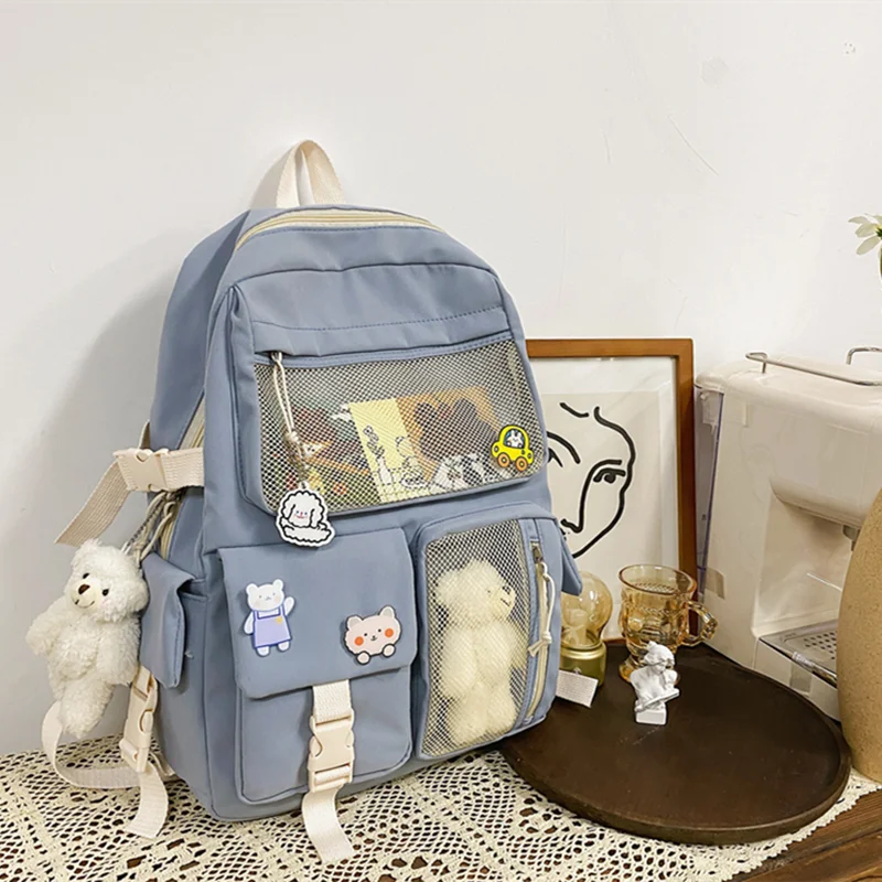 

New Candy Color Cute Women Backpack Fashion Girls Waterproof Buckle Badge Schoolbag For Women Cute Student Bookbag Mochila