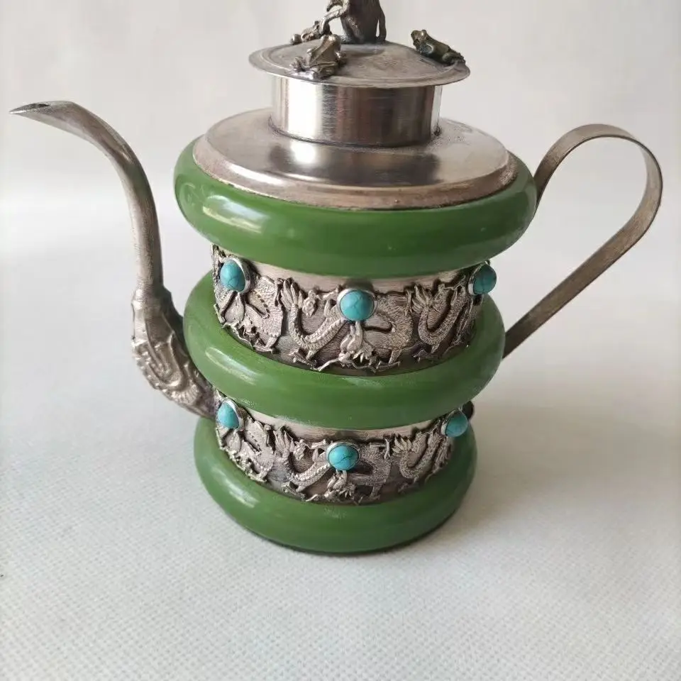 

Chinese exquisite Tibetan silver inlaid jade turquoise dragon teapot